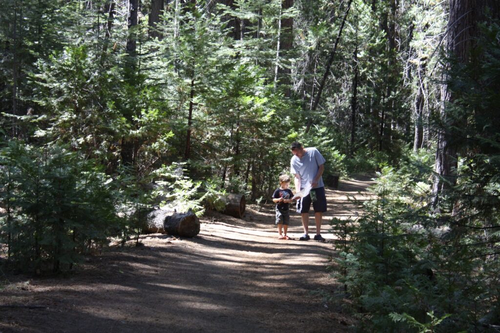 Father and Son on Local Nature Trail at Rush Creek Lodge.